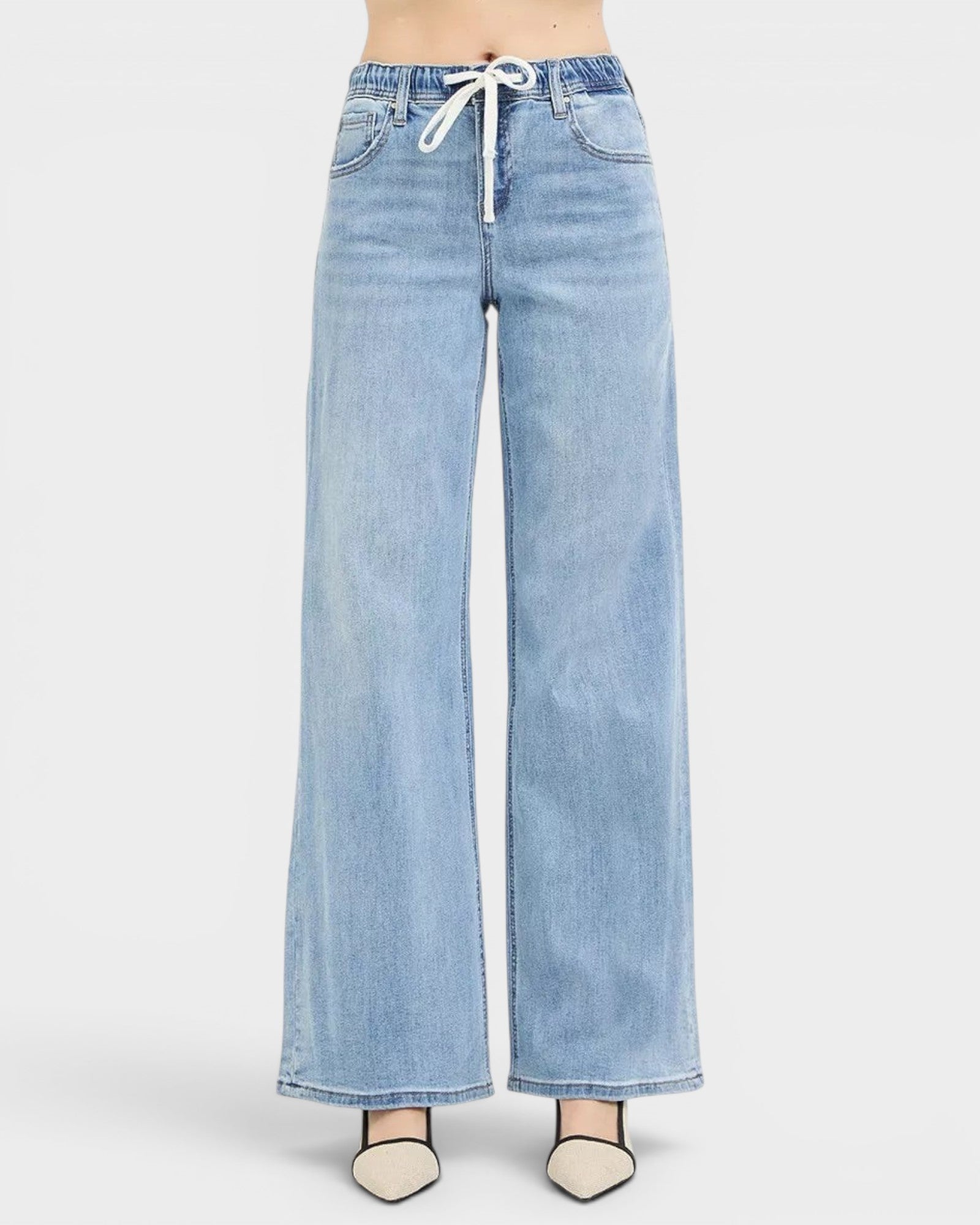 Beach Rose Co. light wash wide leg jeans with drawstring and elastic waistband. Made from cotton blend.