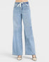 Beach Rose Co. light wash denim wide leg jeans with drawstring waist and pockets. Relaxed fit, casual street style.
