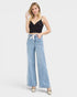 Beach Rose Co. light wash denim wide leg jeans with drawstring waist and pockets. Relaxed fit for casual wear.