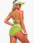 Beach Rose Co. lime green high-waisted bikini with cross-back straps and white trim, worn by a model with a visor.