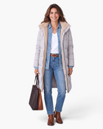 Beach Rose Co. longline quilted coat in light grey with plush fleece lining, worn by a smiling woman with a tote bag.