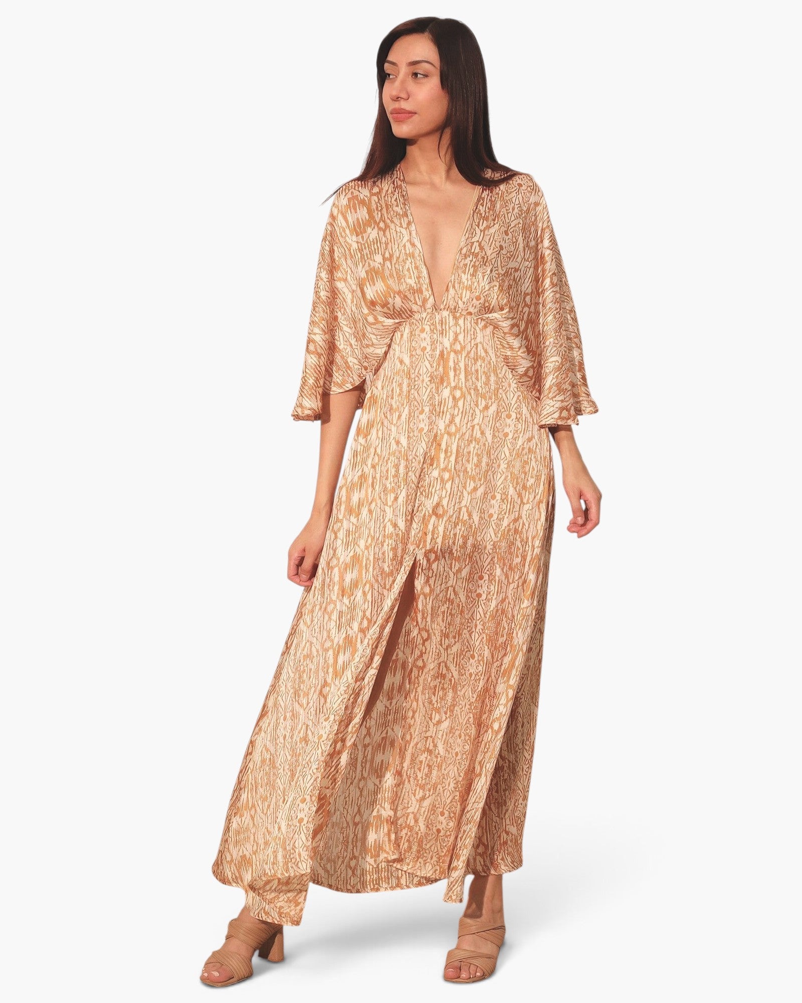Beach Rose Co. bohemian lurex chiffon maxi dress with a cape overlay, deep V-neck, and metallic shimmer pattern.