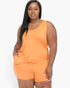 Beach Rose Co. plus size mango orange tank top and shorts lounge set on a model with a relaxed fit.