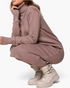 Beach Rose Co. taupe midi sweater dress with ribbed turtleneck and long sleeves worn with cream combat boots