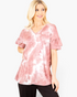 Beach Rose Co. mauve tie-dye V-neck top with layered ruffle sleeves on a blonde model