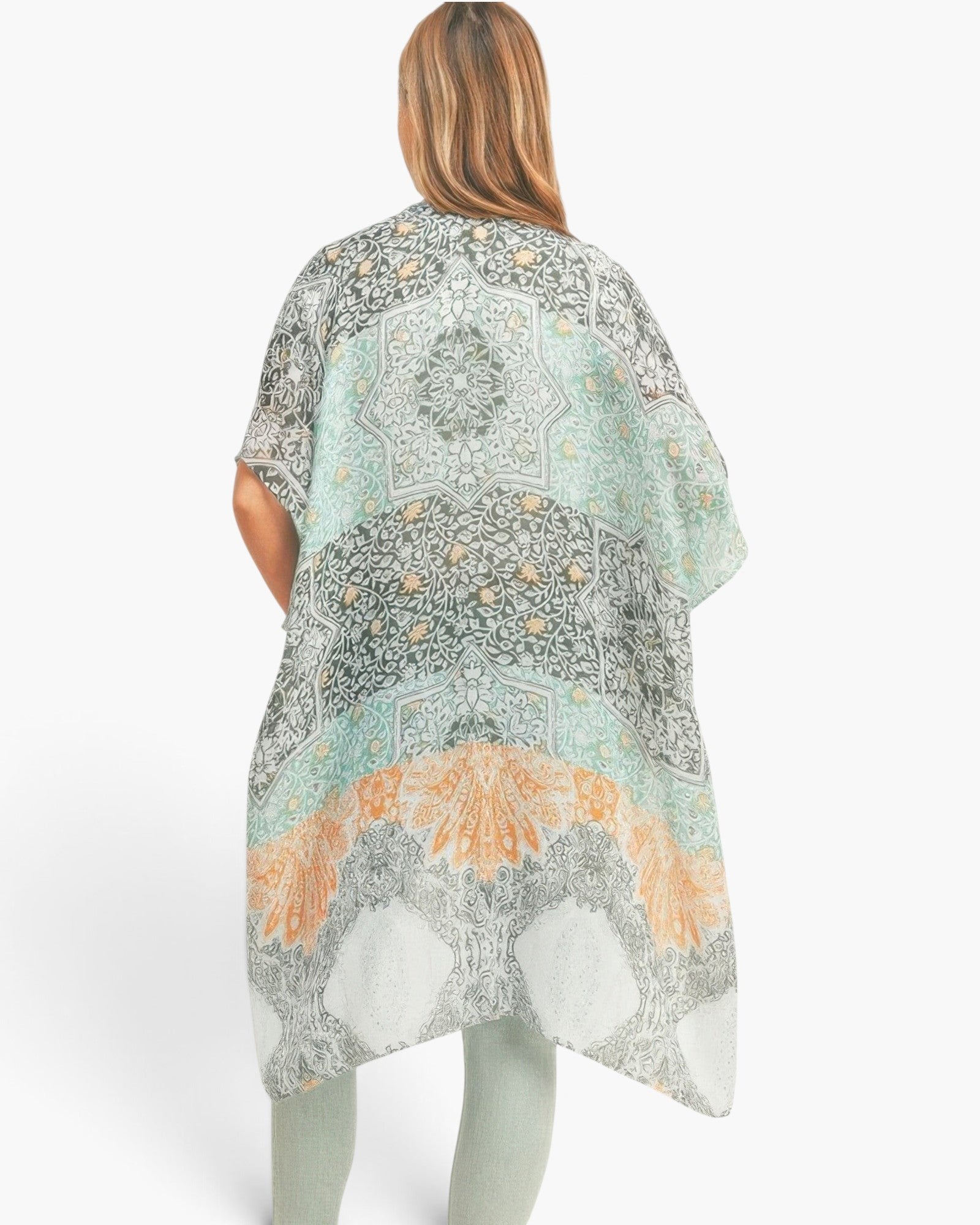 Beach Rose Co. kimono with an ornate medallion print in shades of green, white, and orange on lightweight fabric.