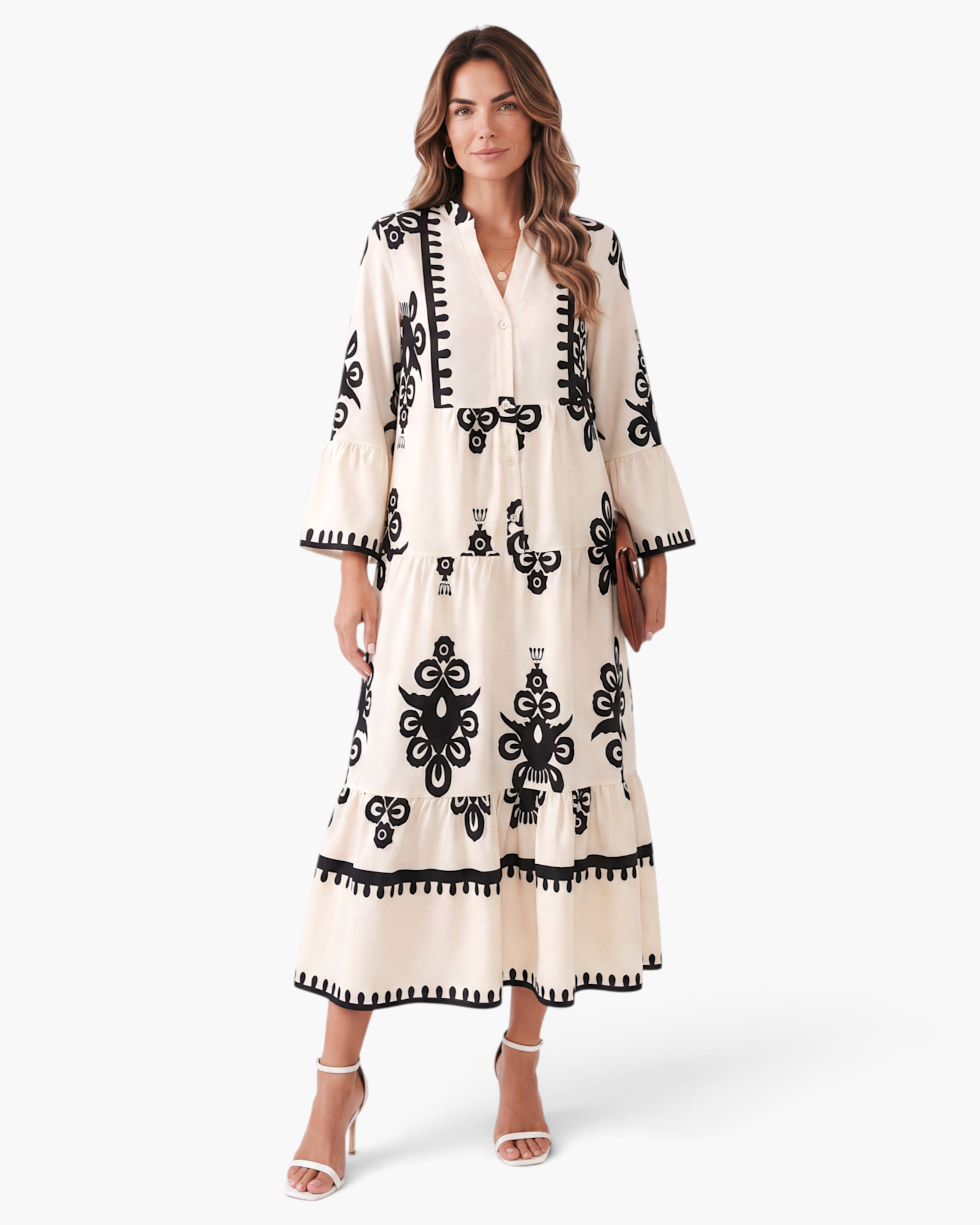 Beach Rose Co. cream maxi dress with black medallion print, button-front bodice, and tiered skirt on a model.