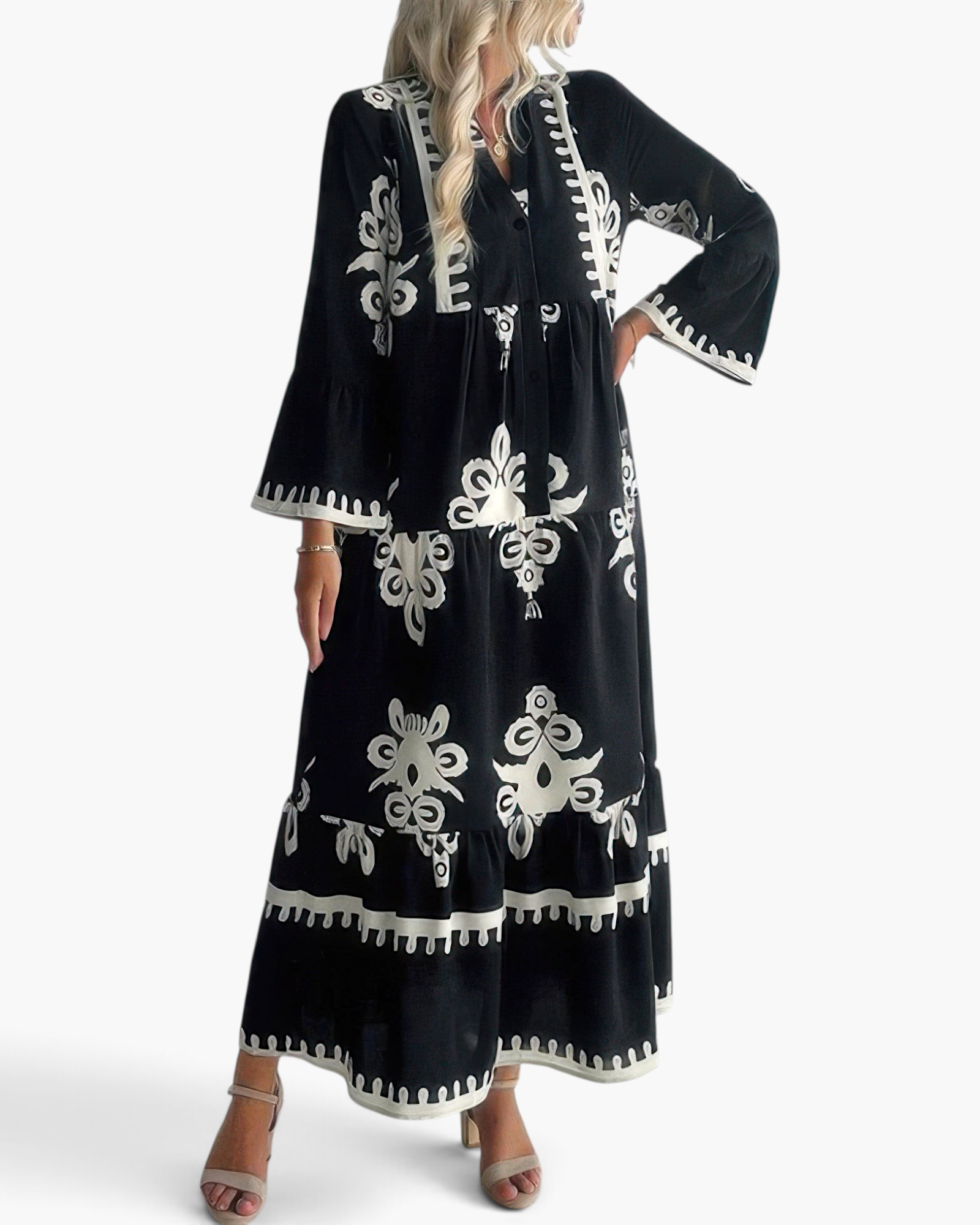 Beach Rose Co. black and white boho maxi dress with medallion print, tiered skirt, and three-quarter bell sleeves.