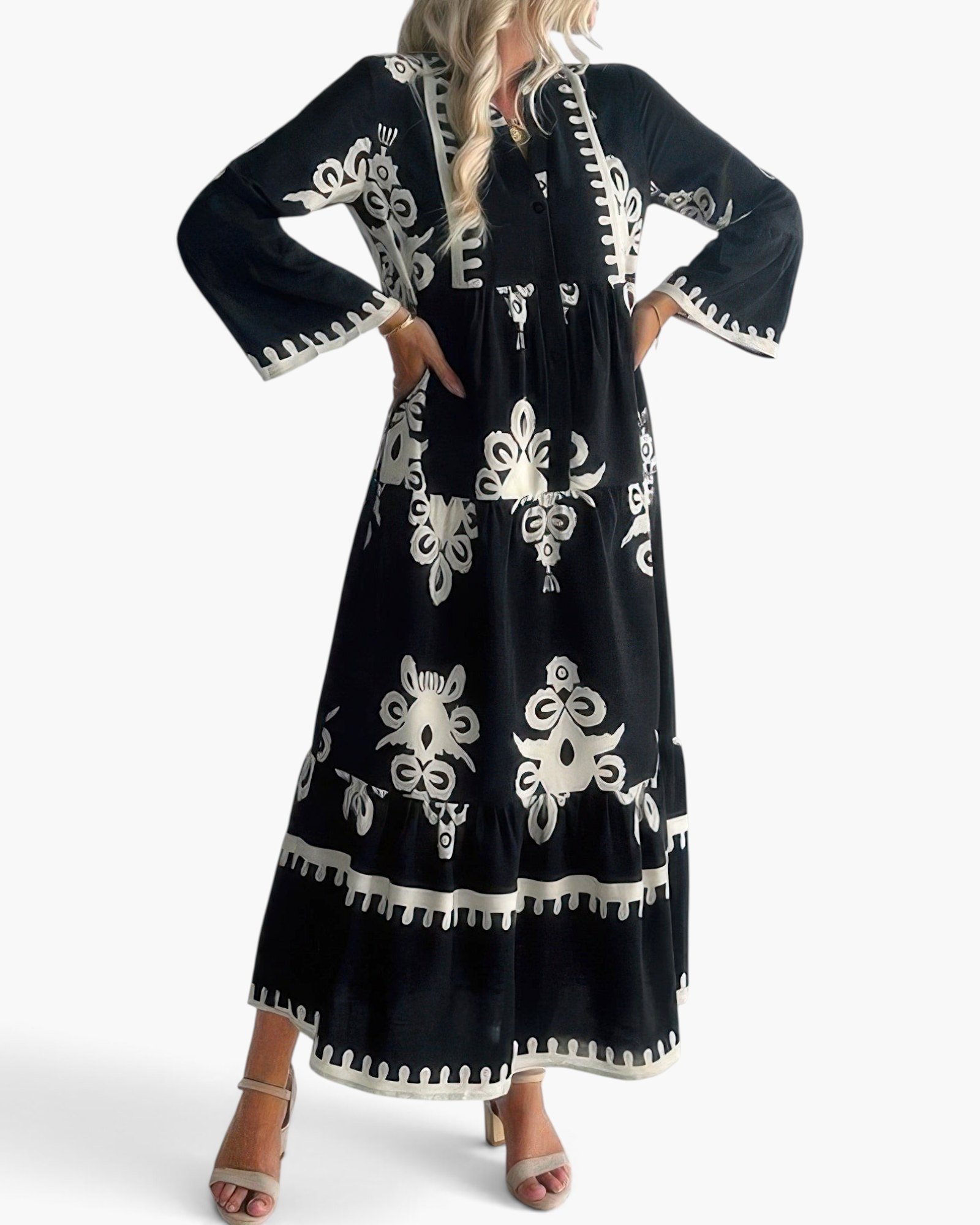 Beach Rose Co. black and white maxi dress with oversized medallion print, tiered silhouette, and bell sleeves.
