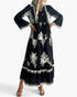 Beach Rose Co. black and white maxi dress with oversized medallion print, tiered silhouette, and bell sleeves.
