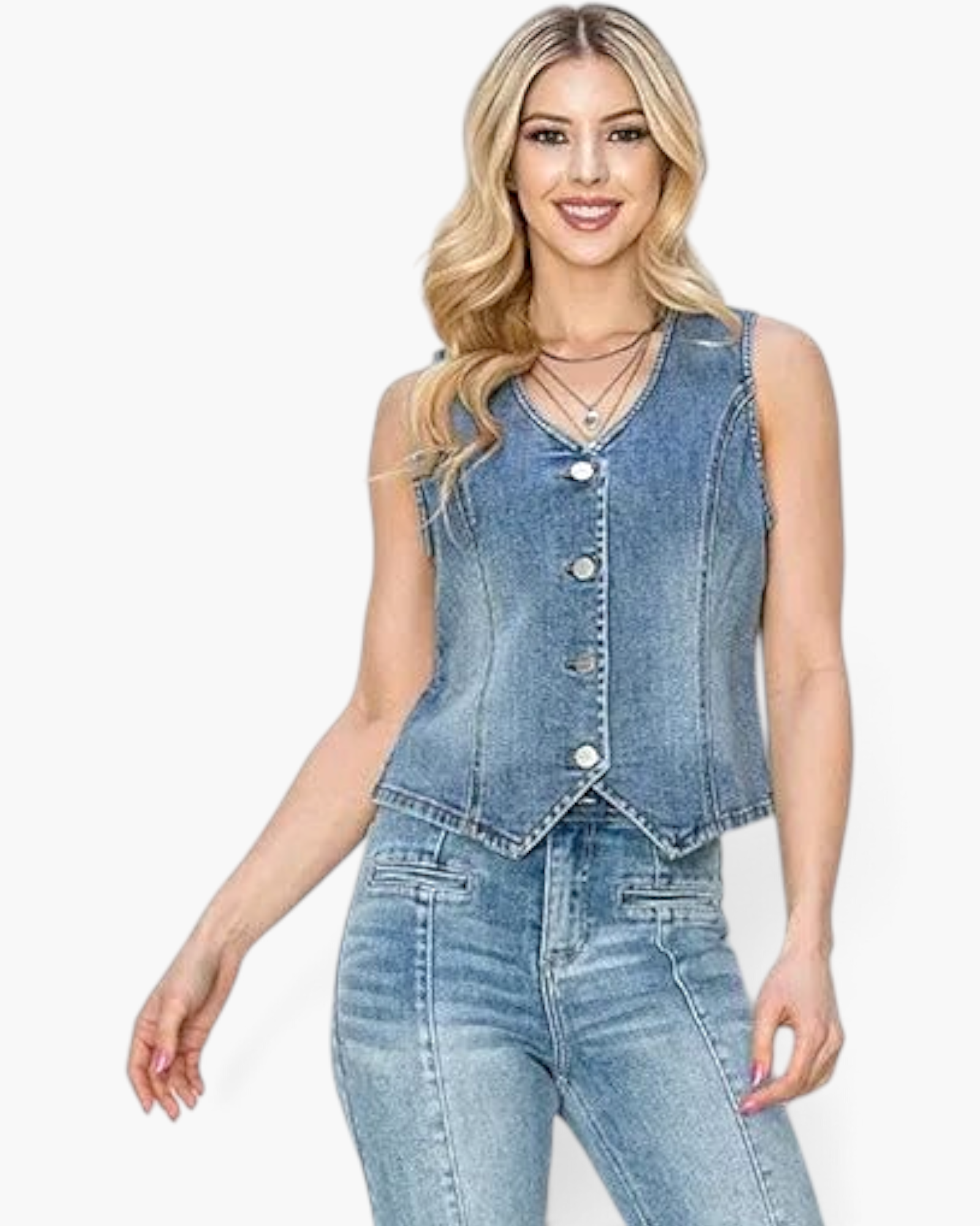 Beach Rose Co. medium wash stretch denim vest with a V-neckline, silver buttons, and an angled hem on a model.