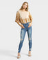 Beach Rose Co. medium wash skinny jeans with distressed details and raw ankle hem. Made of 95% cotton, 5% spandex.