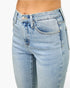 Beach Rose Co. mid-rise light wash denim flare jeans with a classic five-pocket design and metal button closure.
