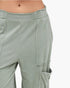 Beach Rose Co. sage green mineral wash cotton cargo pants with high-rise elastic waistband and raw edge pockets
