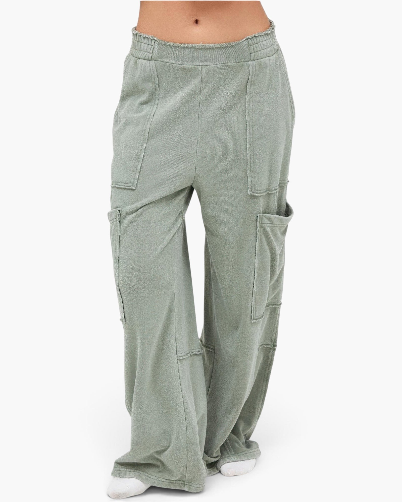 Beach Rose Co. sage green mineral wash wide leg cargo pants with raw edge patch pockets and high-rise elastic waist.