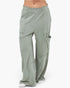 Beach Rose Co. sage green mineral wash wide leg cargo pants with raw edge patch pockets and high-rise elastic waist.