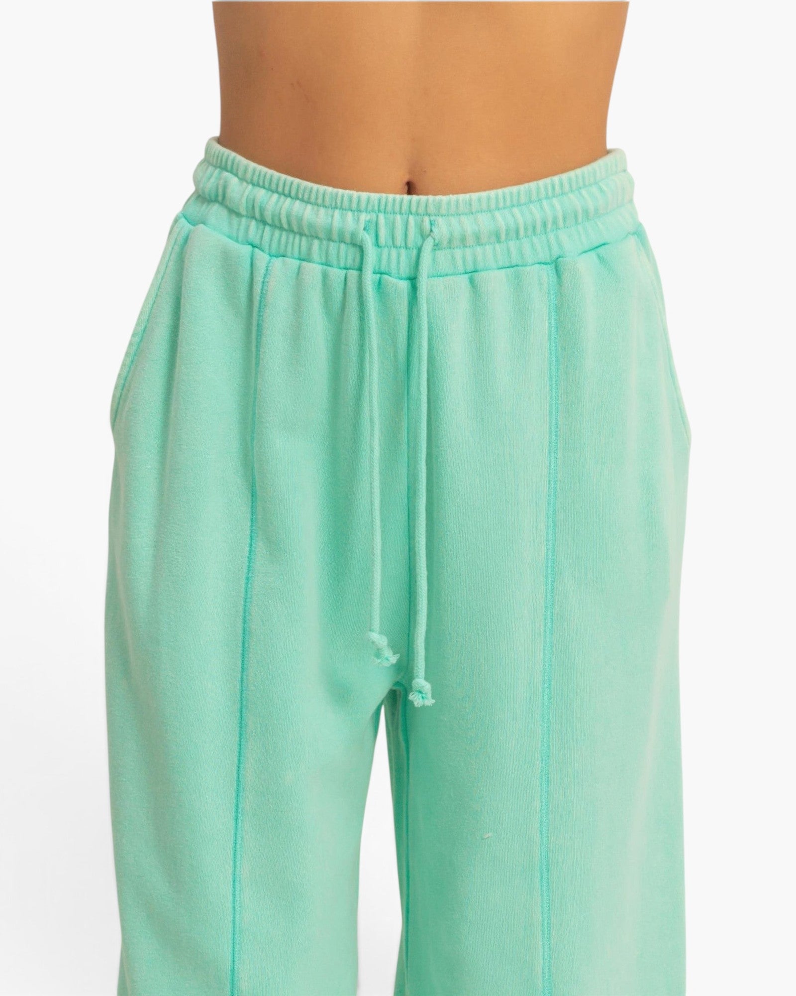Beach Rose Co. mint green acid wash French terry wide-leg pants with a high-rise drawstring waist and center seams.