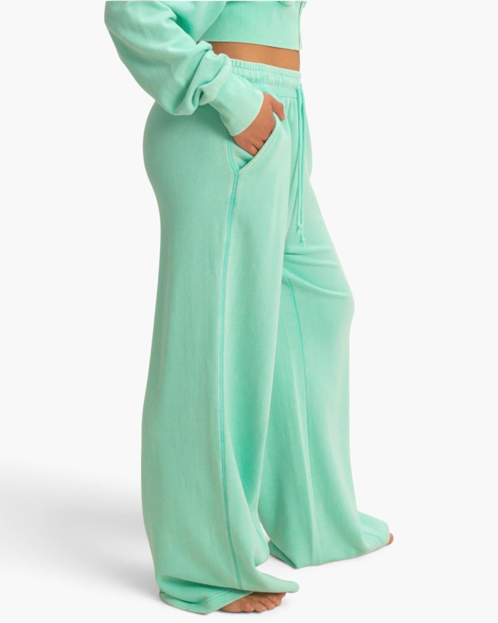 Beach Rose Co. mint green acid wash French terry wide-leg pants with side pockets and a high-rise drawstring waist.