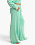 Beach Rose Co. mint green acid wash French terry wide-leg pants with side pockets and a high-rise drawstring waist.