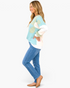 Beach Rose Co. mint, cream, and heather-gray patchwork top with plaid panels and long sleeves on a blonde model