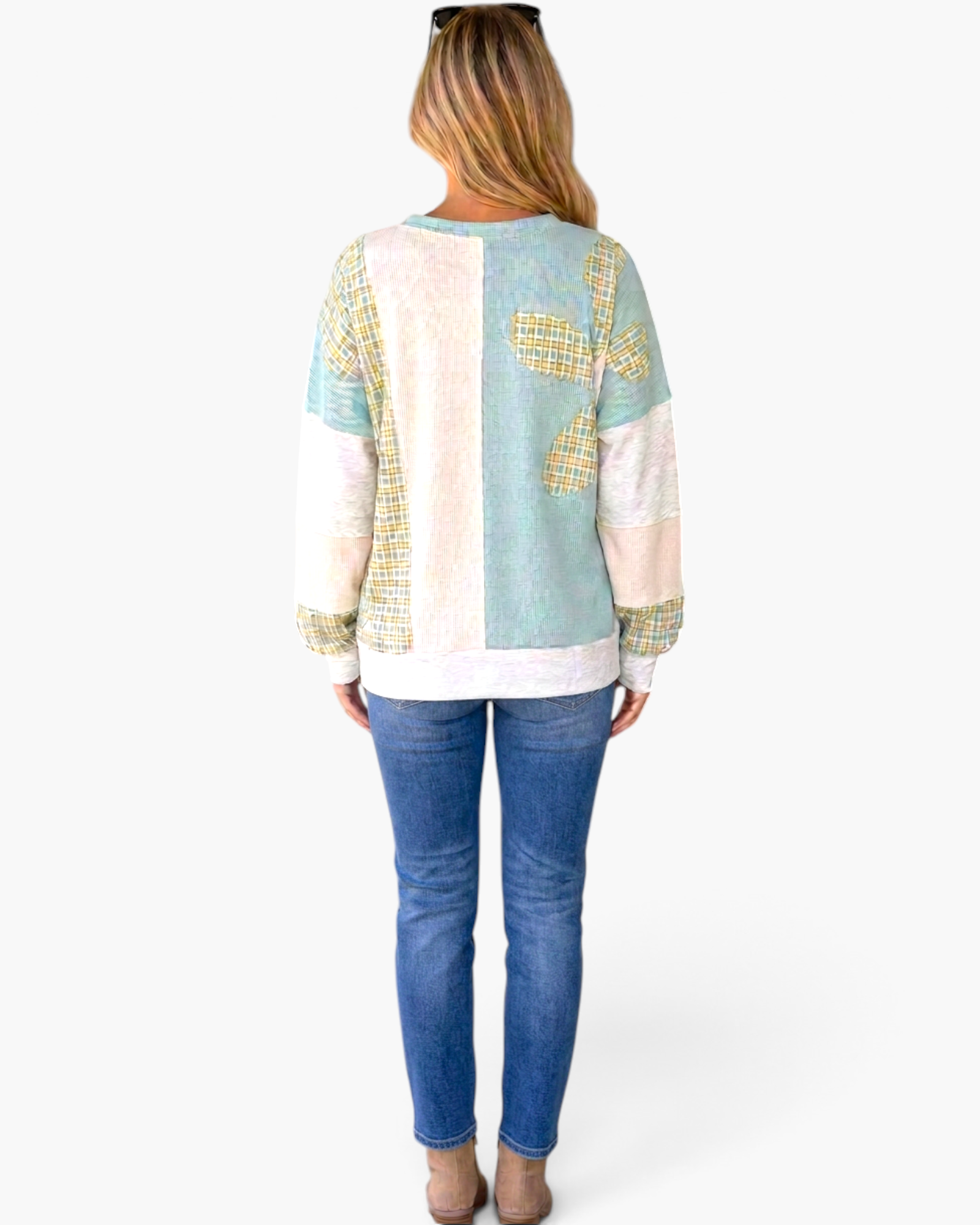 Beach Rose Co. mint patchwork plaid top with long sleeves and color-block design worn by a woman from behind