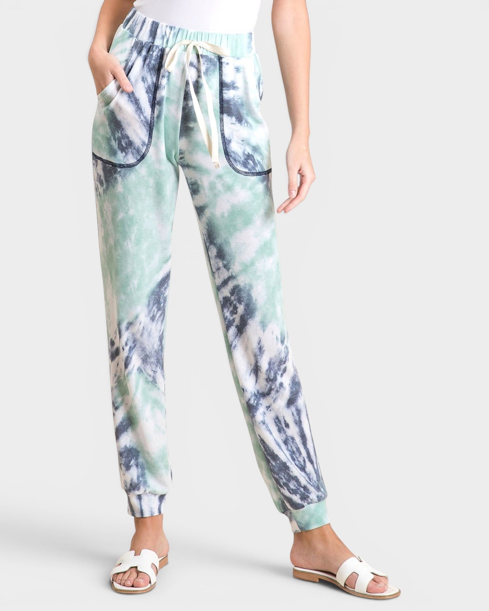 Beach Rose Co. mint, white, and charcoal tie-dye joggers made of polyester and spandex with drawstring waist and pockets.