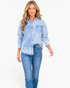 Beach Rose Co. light blue button-front shirt featuring mixed striped and washed denim-look panels on a model.