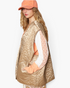 Beach Rose Co. mocha floral quilted nylon zip-up vest with oversized patch pockets worn by a model in a cap.