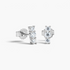 Beach Rose Co. three-stone moissanite bar stud earrings in sterling silver with a vertical row of round stones.