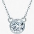 Beach Rose Co. 1 carat round moissanite solitaire necklace in a silver bezel setting on a delicate link chain