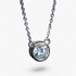 Beach Rose Co. 1 carat round moissanite solitaire necklace in a silver bezel setting on a delicate link chain.