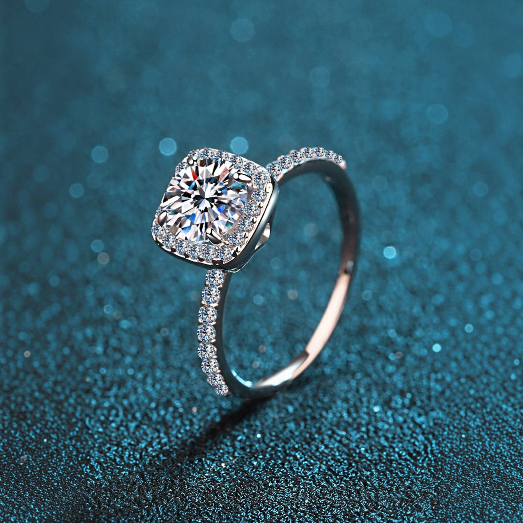 Beach Rose Co. 1 carat round moissanite ring with a square halo and zircon accents in rhodium-plated sterling silver.