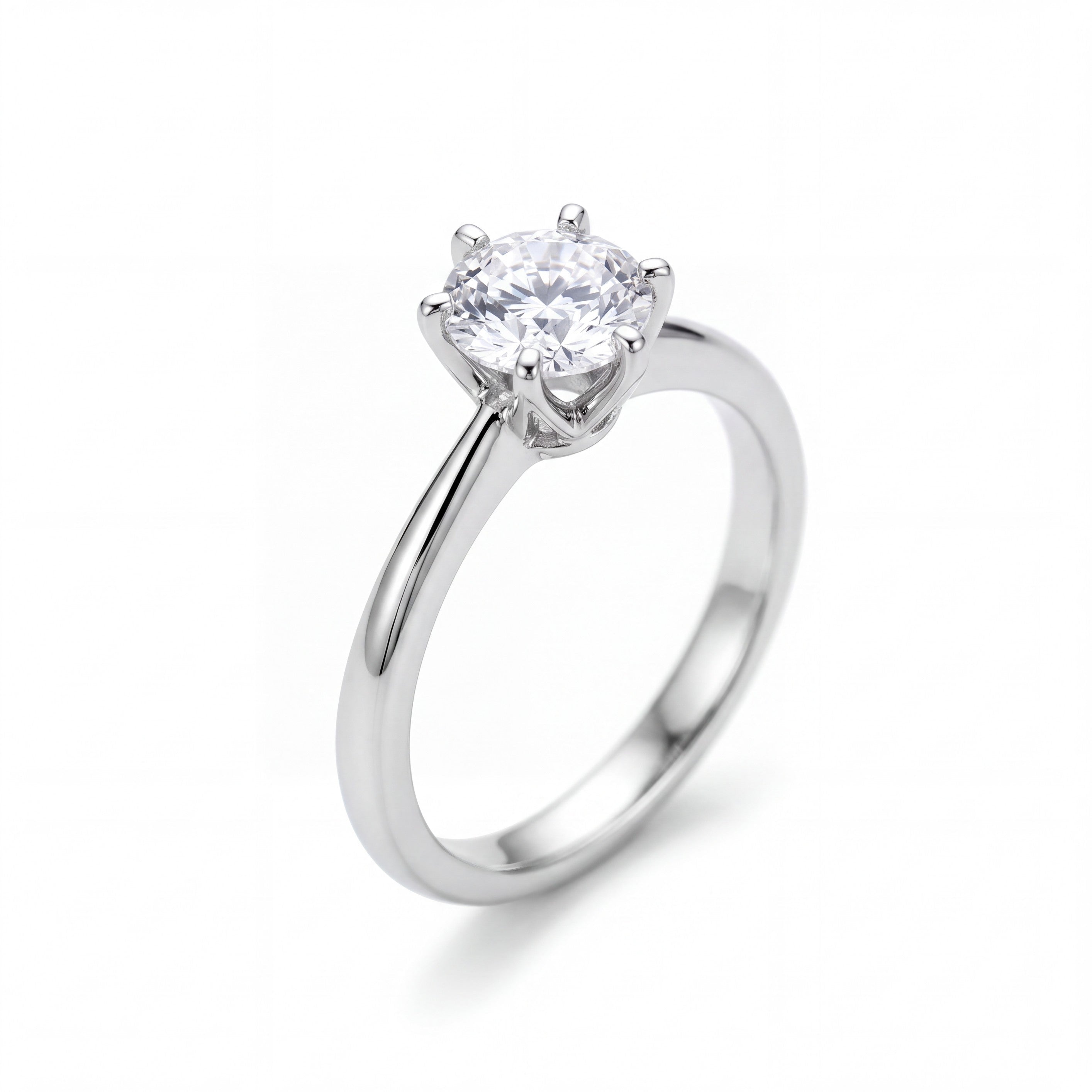 Beach Rose Co. 1 carat round moissanite solitaire ring in platinum-plated sterling silver with a six-prong setting.