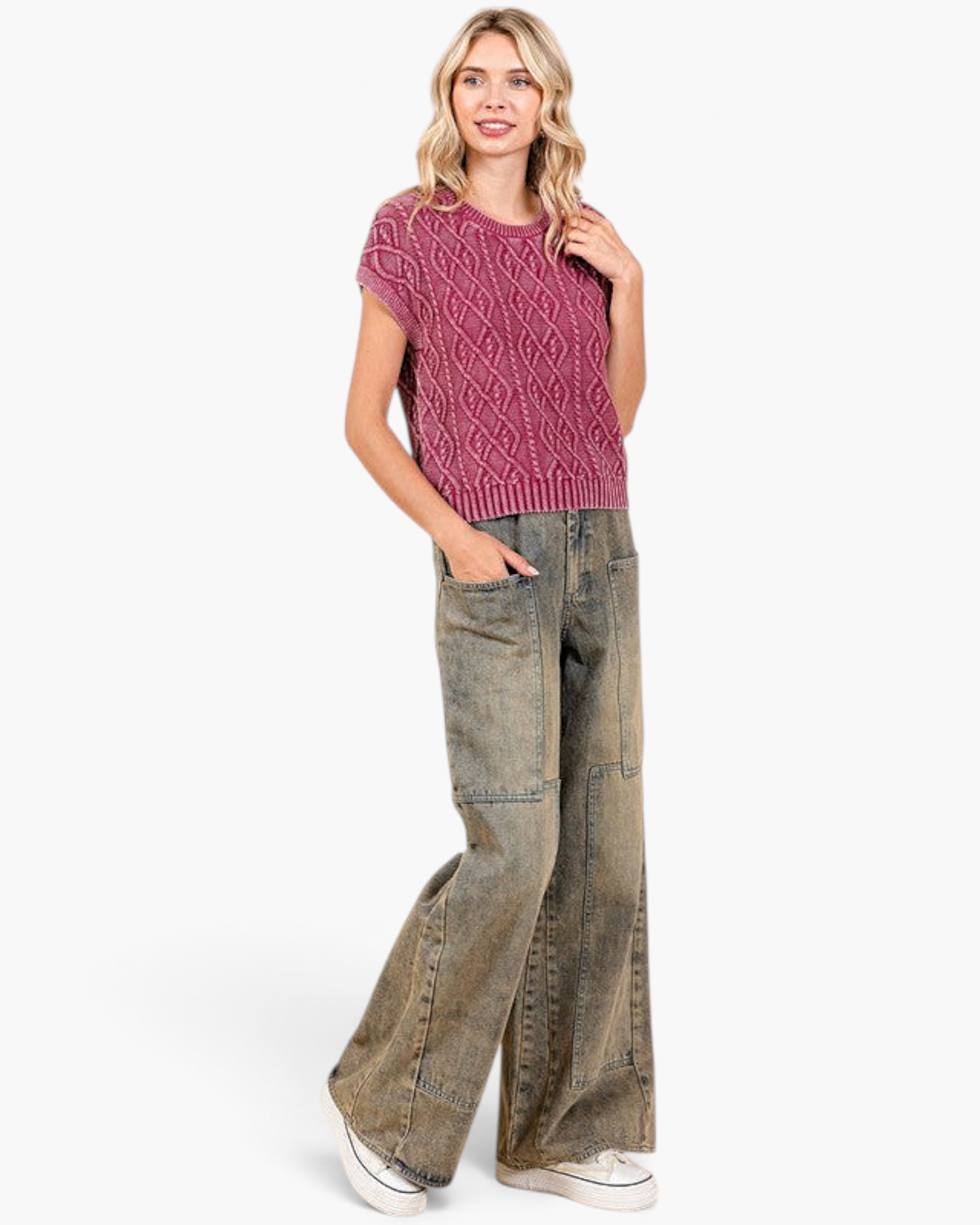Beach Rose Co. model wearing mud-wash wide-leg jeans with patch pockets and a pink cable-knit sweater