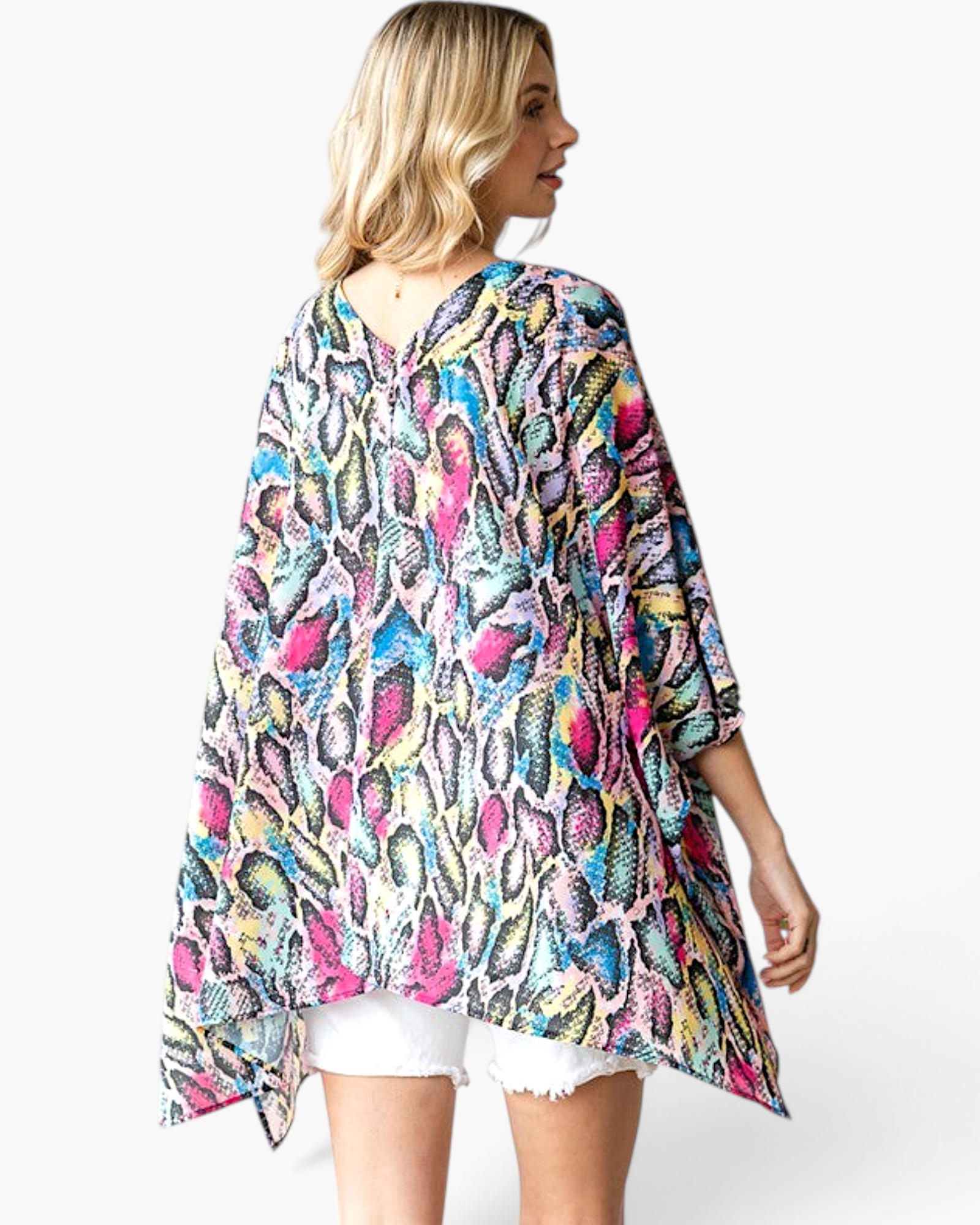 Beach Rose Co. multicolor snake print kimono with an asymmetrical hem and flowy oversized fit worn by a model