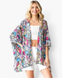 Beach Rose Co. multicolor snake print kimono with an open-front design and flowy sleeves worn by a smiling model.