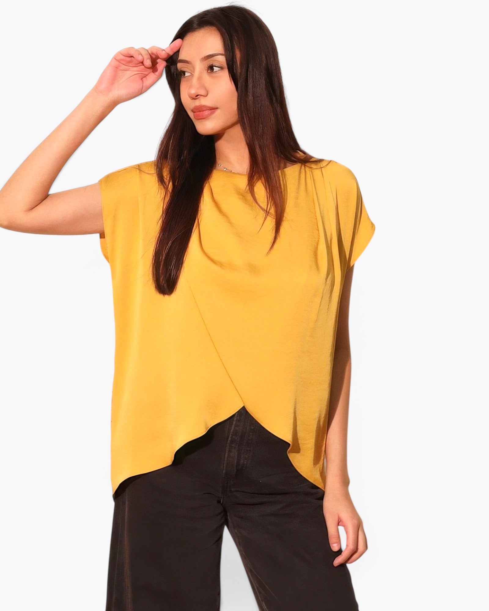 Beach Rose Co. mustard yellow washed poly silk tulip tunic top worn by a model with black trousers
