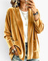 Beach Rose Co. mustard yellow velour open-front cardigan with patch pockets and relaxed fit worn over a white tee
