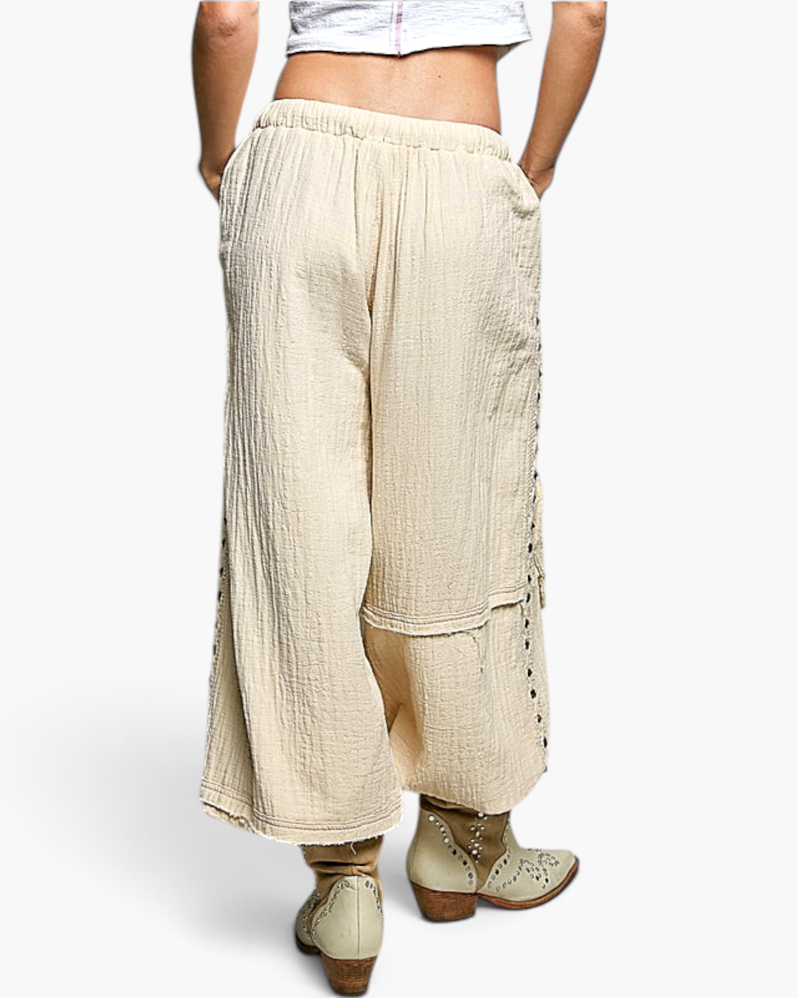 Beach Rose Co. natural cotton double-gauze jogger pants with studded side seams and raw-edge details, back view.