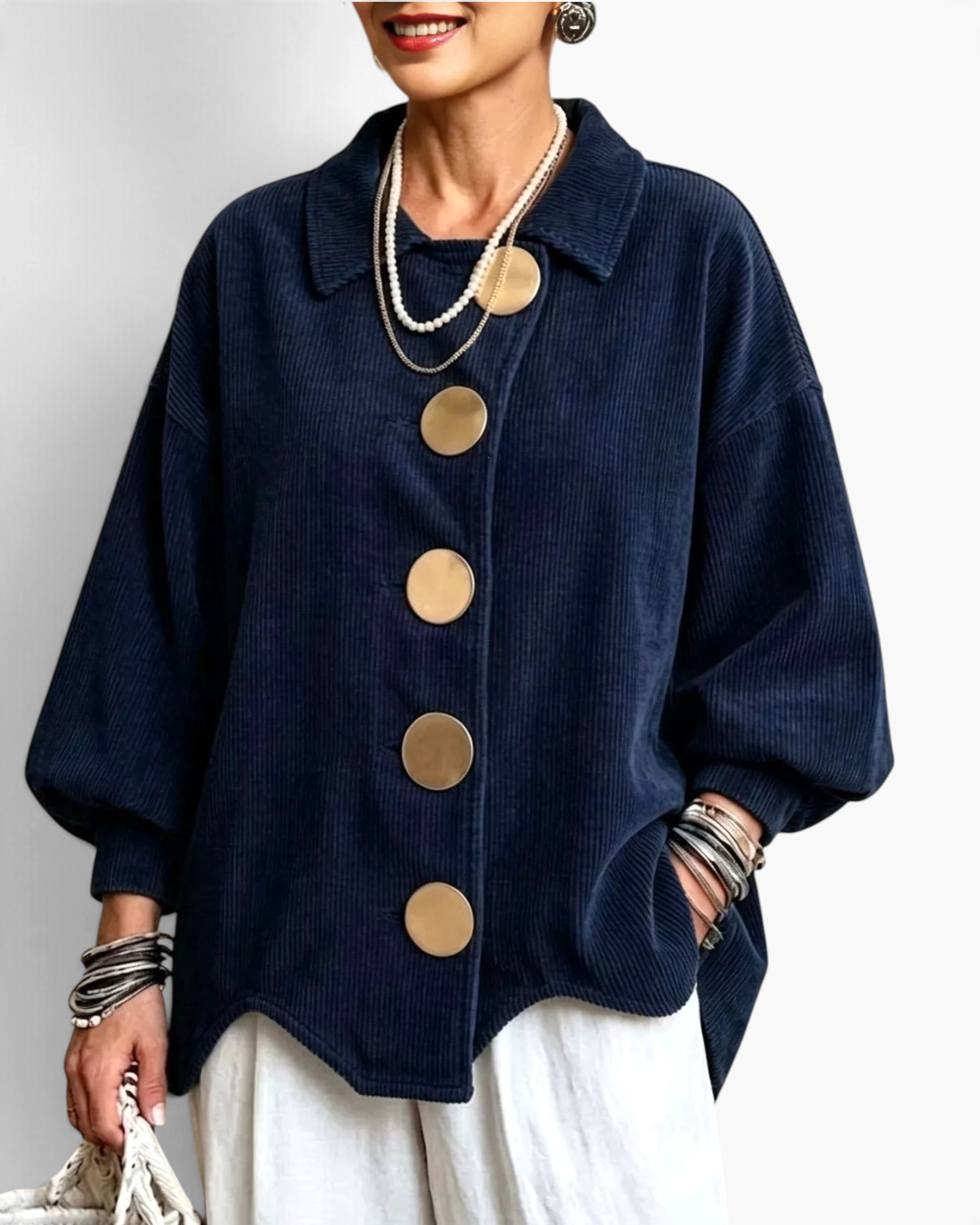 Beach Rose Co. navy blue corduroy shacket with oversized gold buttons, balloon sleeves, and a relaxed curved hem.