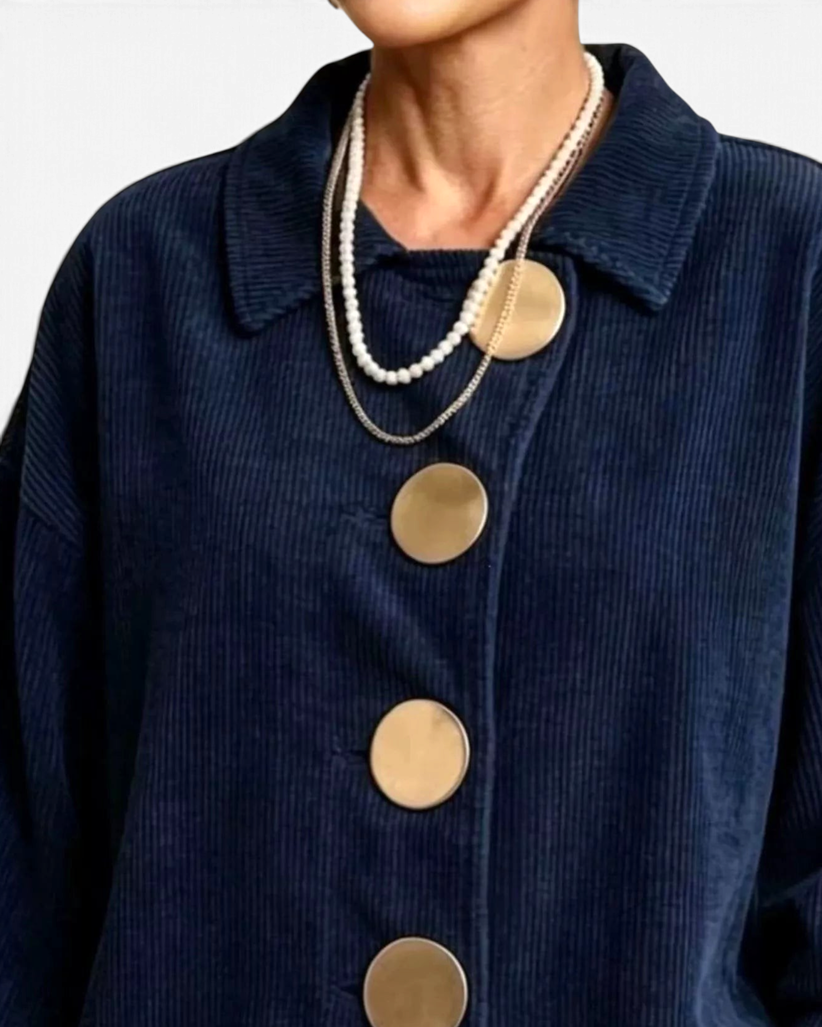 Beach Rose Co. navy blue corduroy shacket featuring large round buttons, a collared neckline, and relaxed fit.