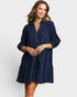 Beach Rose Co. navy corduroy tiered mini dress with collared split neckline, puff sleeves, and side pockets.