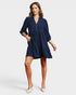 Beach Rose Co. navy corduroy tiered mini dress with collared split neckline, puff sleeves, and side pockets.