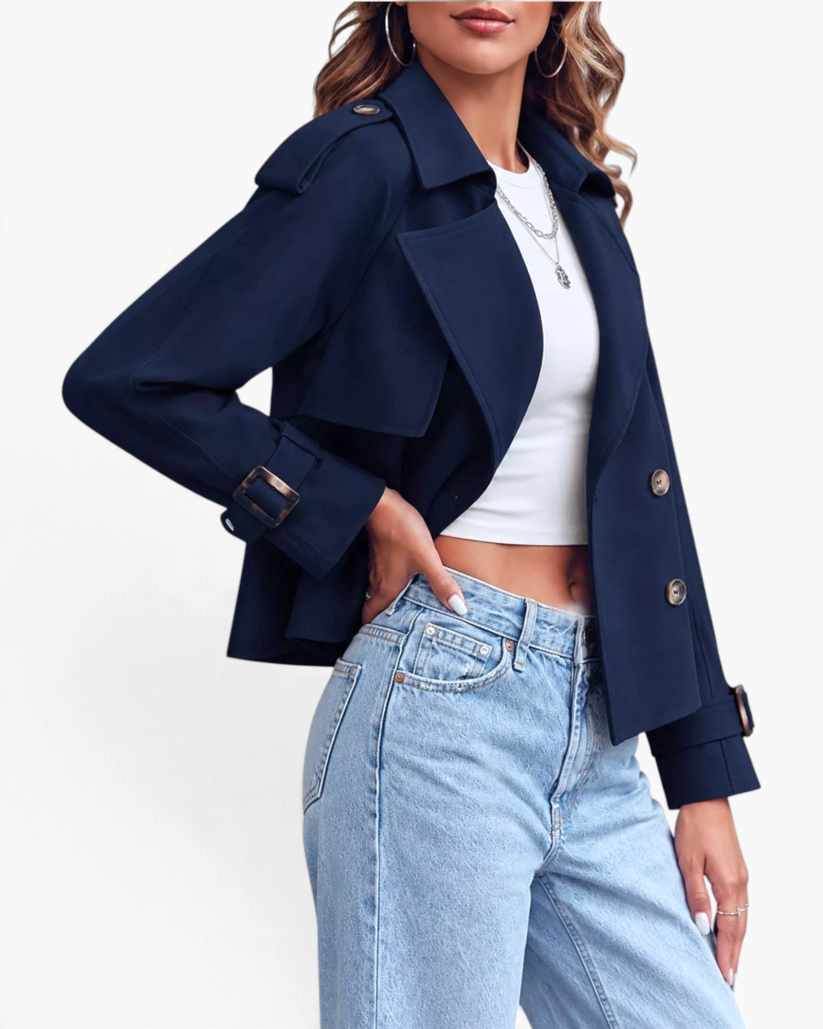 Beach Rose Co. navy cropped double-breasted trench jacket with wide lapels and buckled cuffs worn by a model