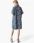 Beach Rose Co. navy longline kimono with a colorful floral print, featuring short sleeves and a relaxed fit.