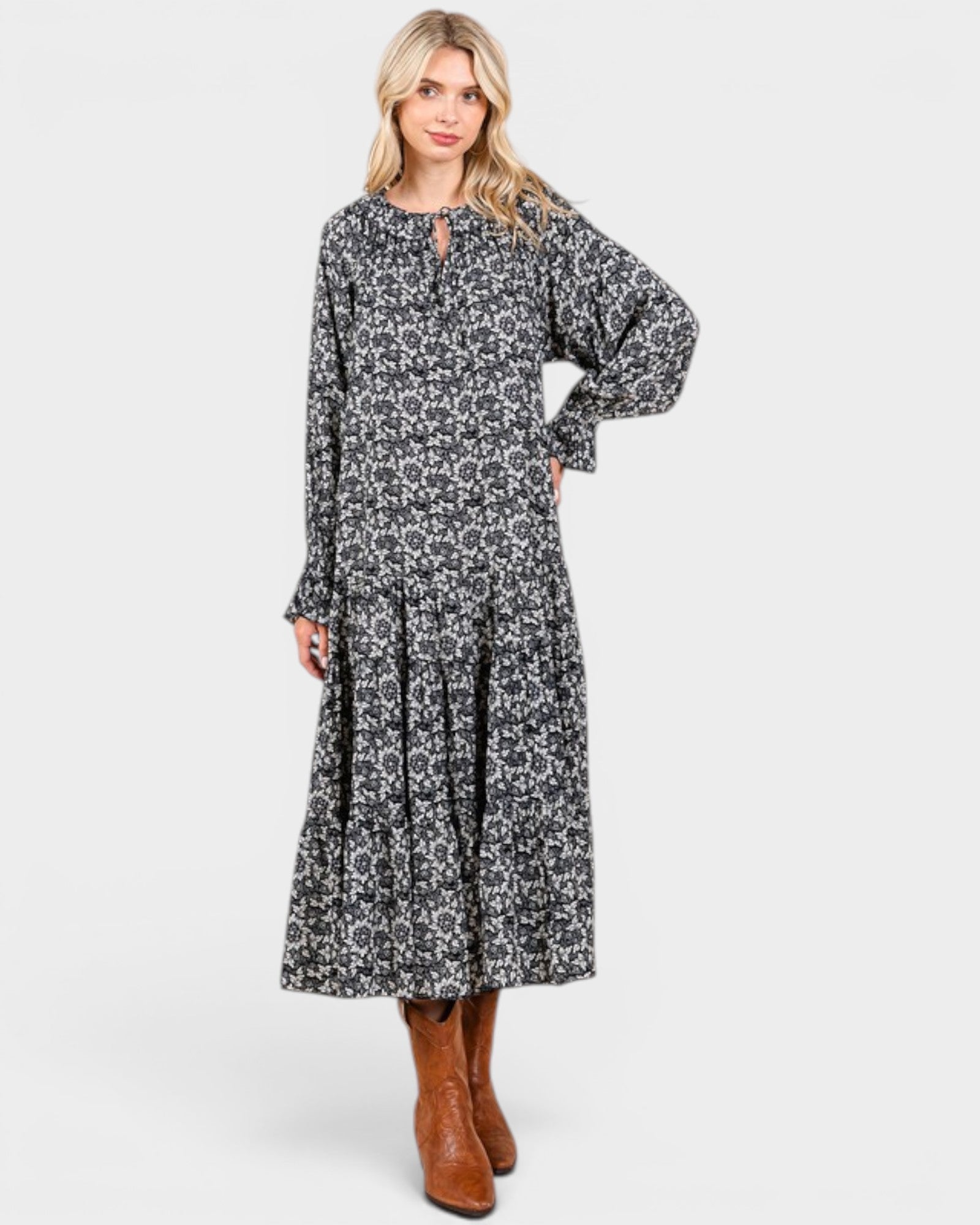 Beach Rose Co. navy floral maxi dress with long sleeves, tie neckline, and tiered skirt in lightweight rayon fabric