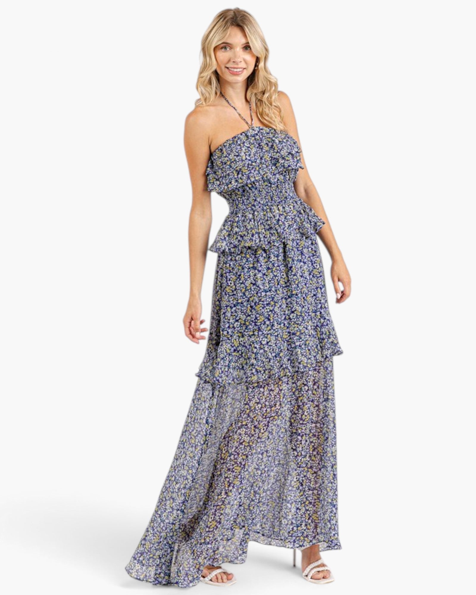 Beach Rose Co. dark navy floral maxi dress with a smocked bodice, halter tie neckline, and cascading tiered ruffles.