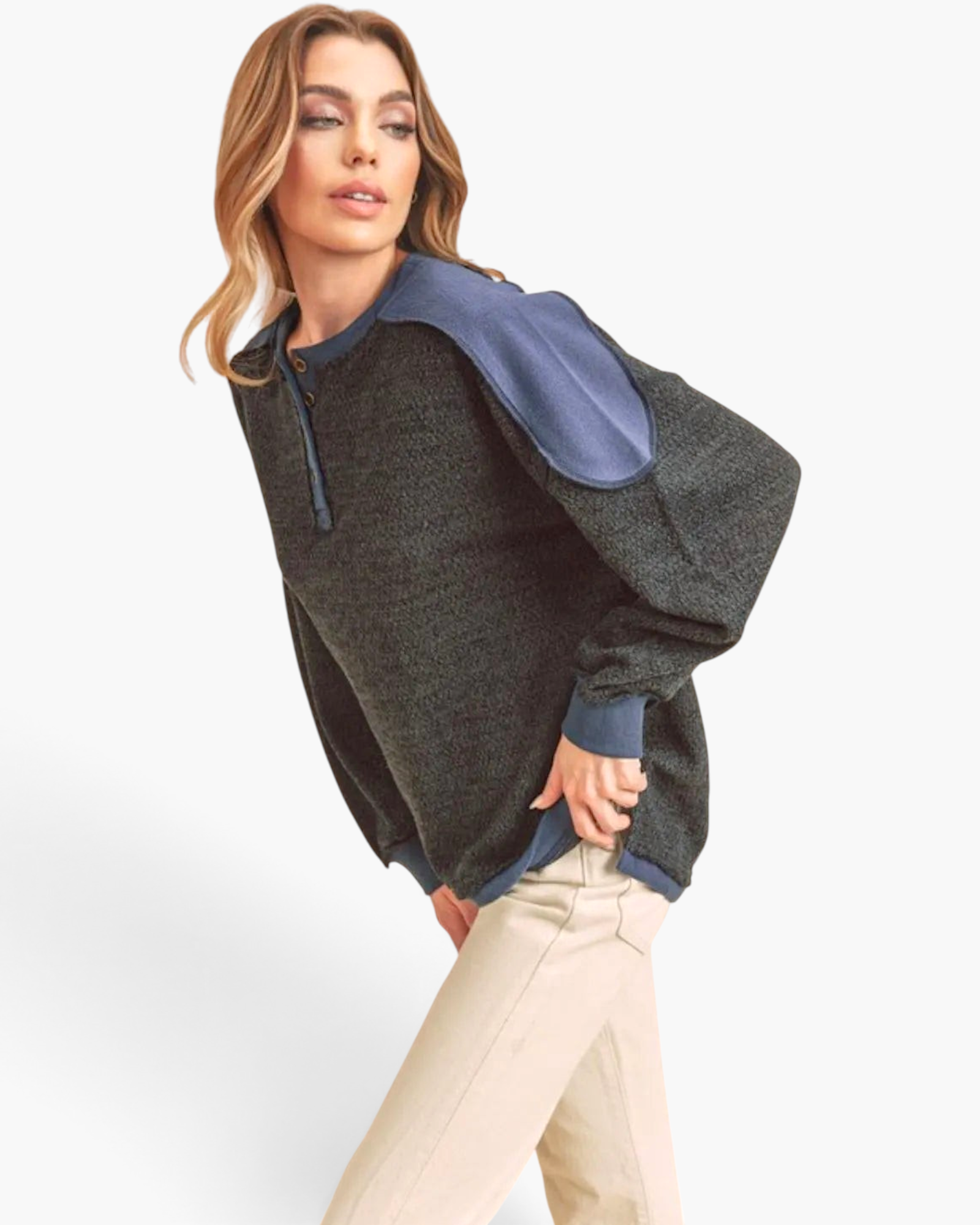 Beach Rose Co. dark navy textured knit Henley pullover with contrast shoulder panels and balloon sleeves on a model.