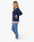 Beach Rose Co. navy mock neck sweatshirt with striped trim, dropped shoulders, and textured fabric on a model.