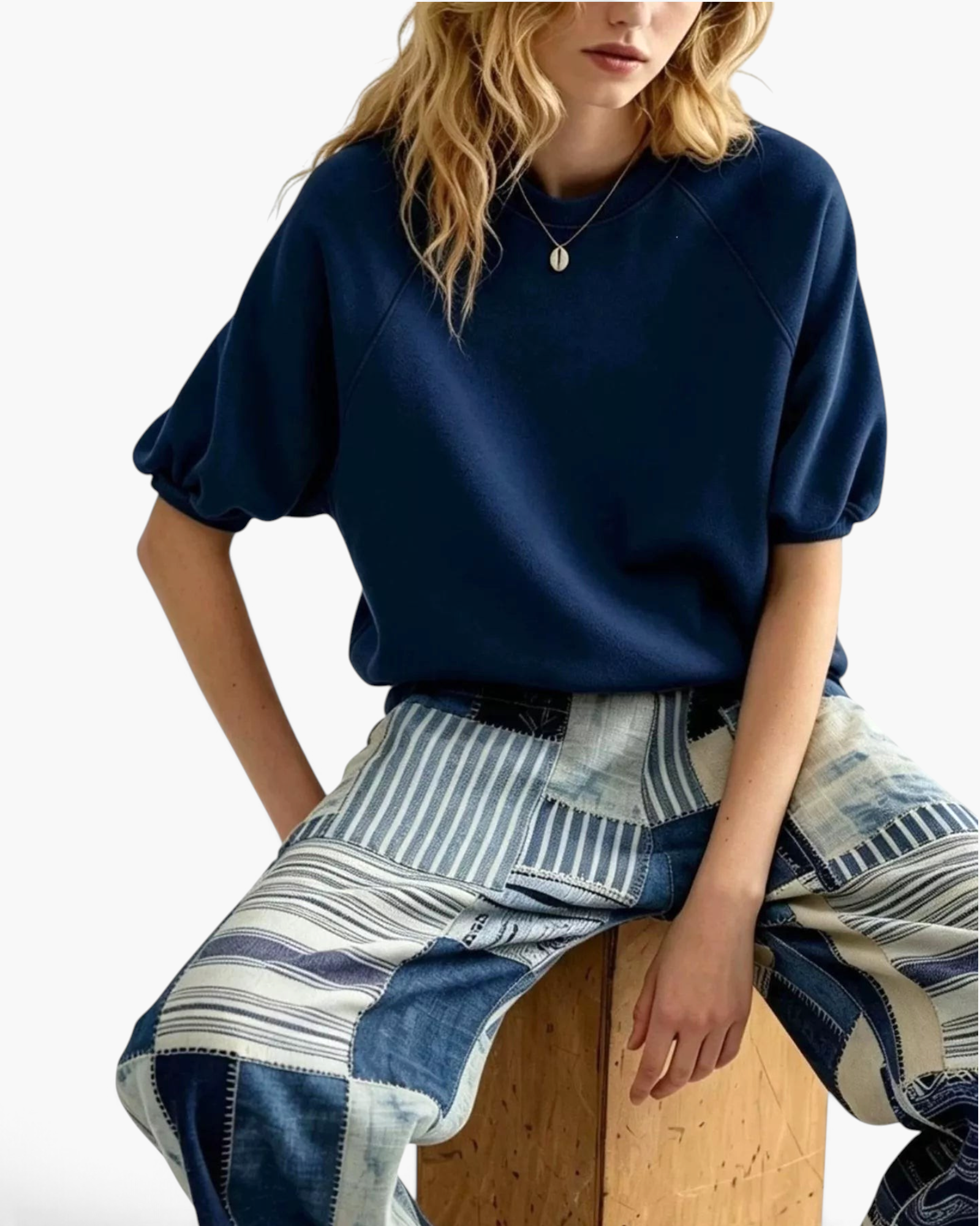 Beach Rose Co. navy blue polyester sweatshirt with elbow-length puff sleeves and raglan seams on a model